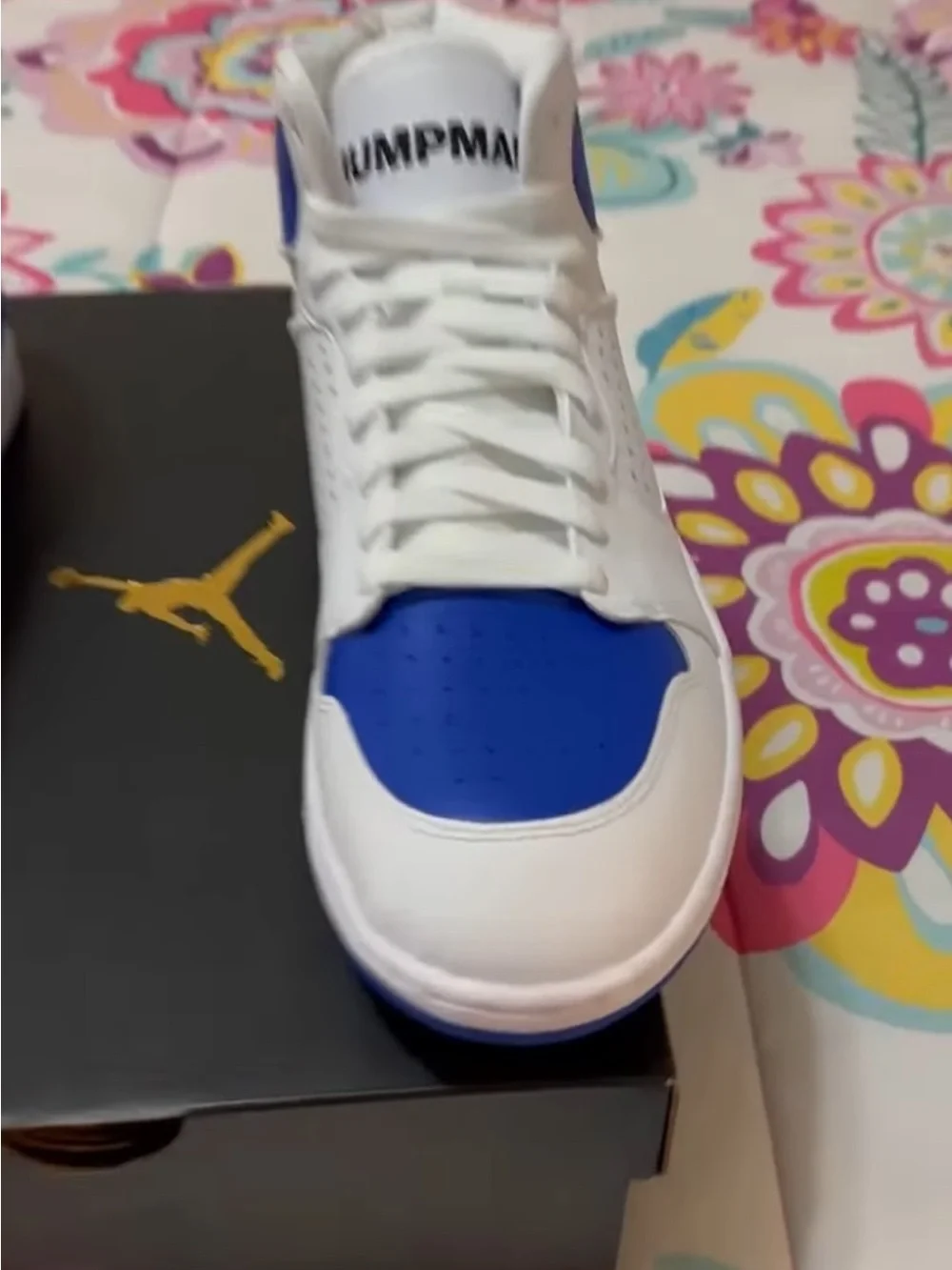 Jordan Men’s White and Blue High-Top Sneakers with Royal Blue Accents